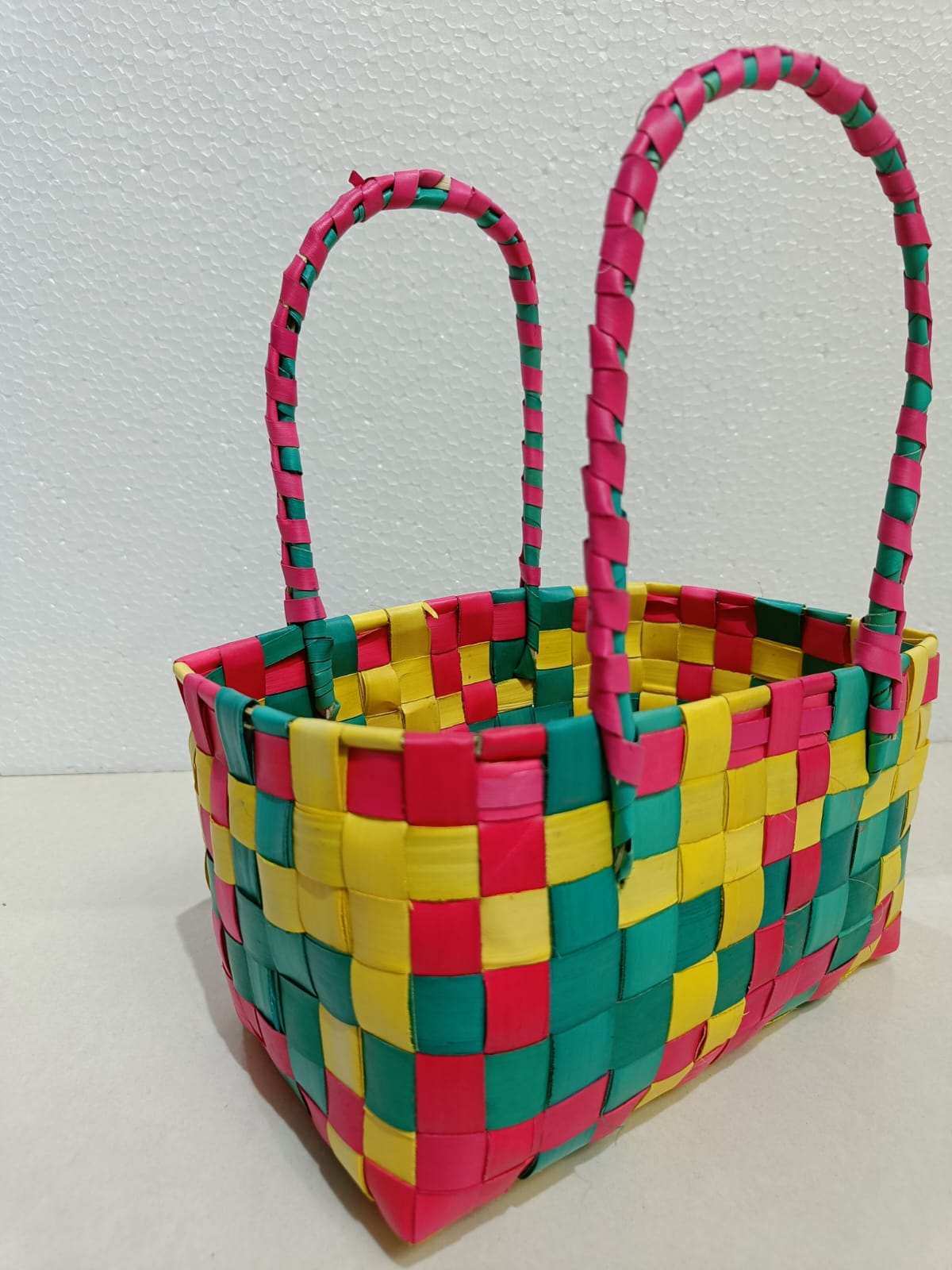 PALM LEAF HANDLE BASKET